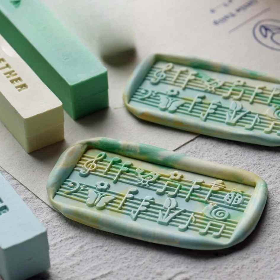 Sello de Bronce 3D para Lacre "Notas musicales"